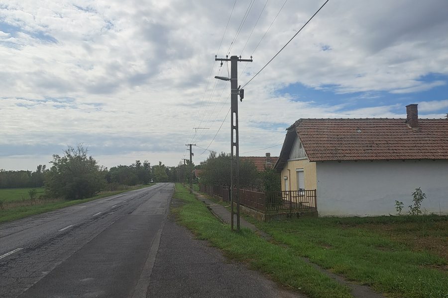 The main street of Darvas with the new public lighting pole